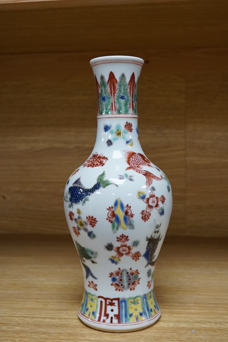 A Chinese wucai ‘fish and flower’ vase, 26cm